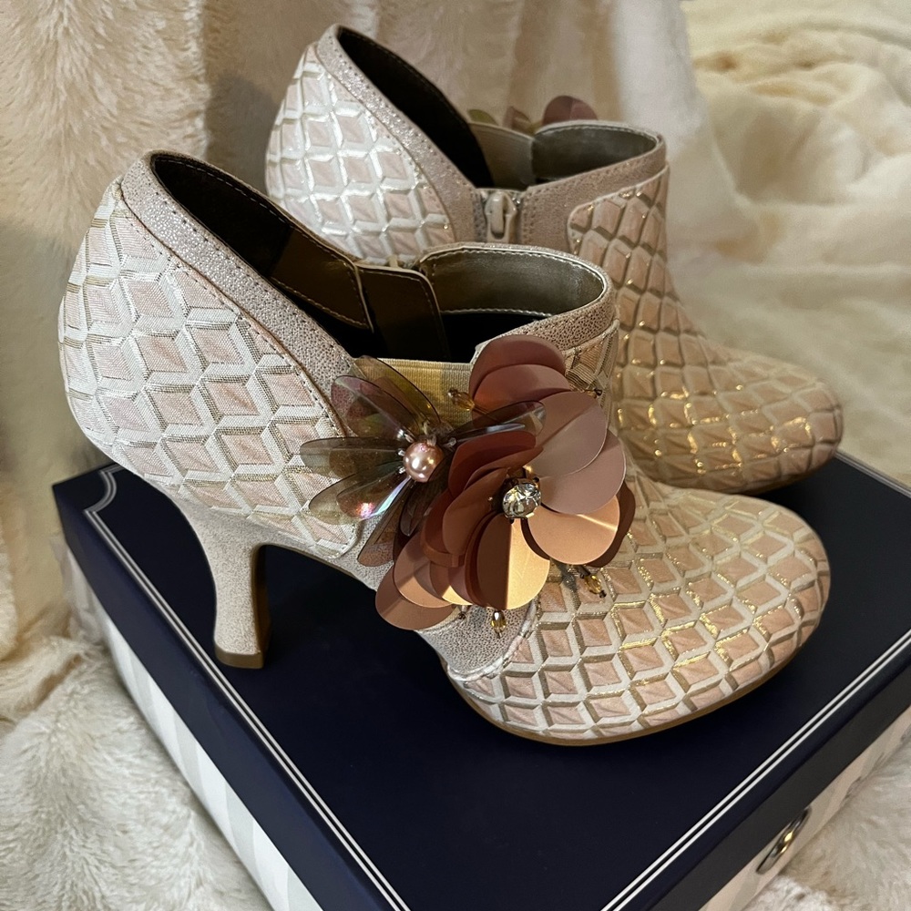 Elegant Cream Heeled Ankle Boots with Floral Accent